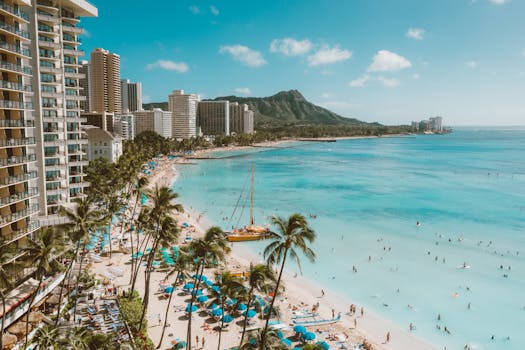 Photo by Jess Loiterton A stunning aerial view of Waikiki Beach, Honolulu with Diamond Head in the background.