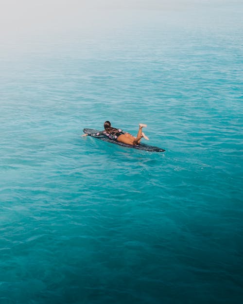 2 Person in the Middle of Ocean