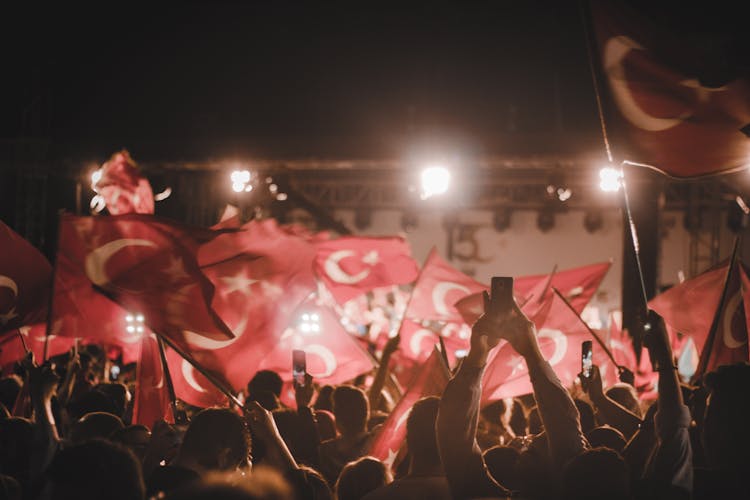 People Swaying The Turkish Flag