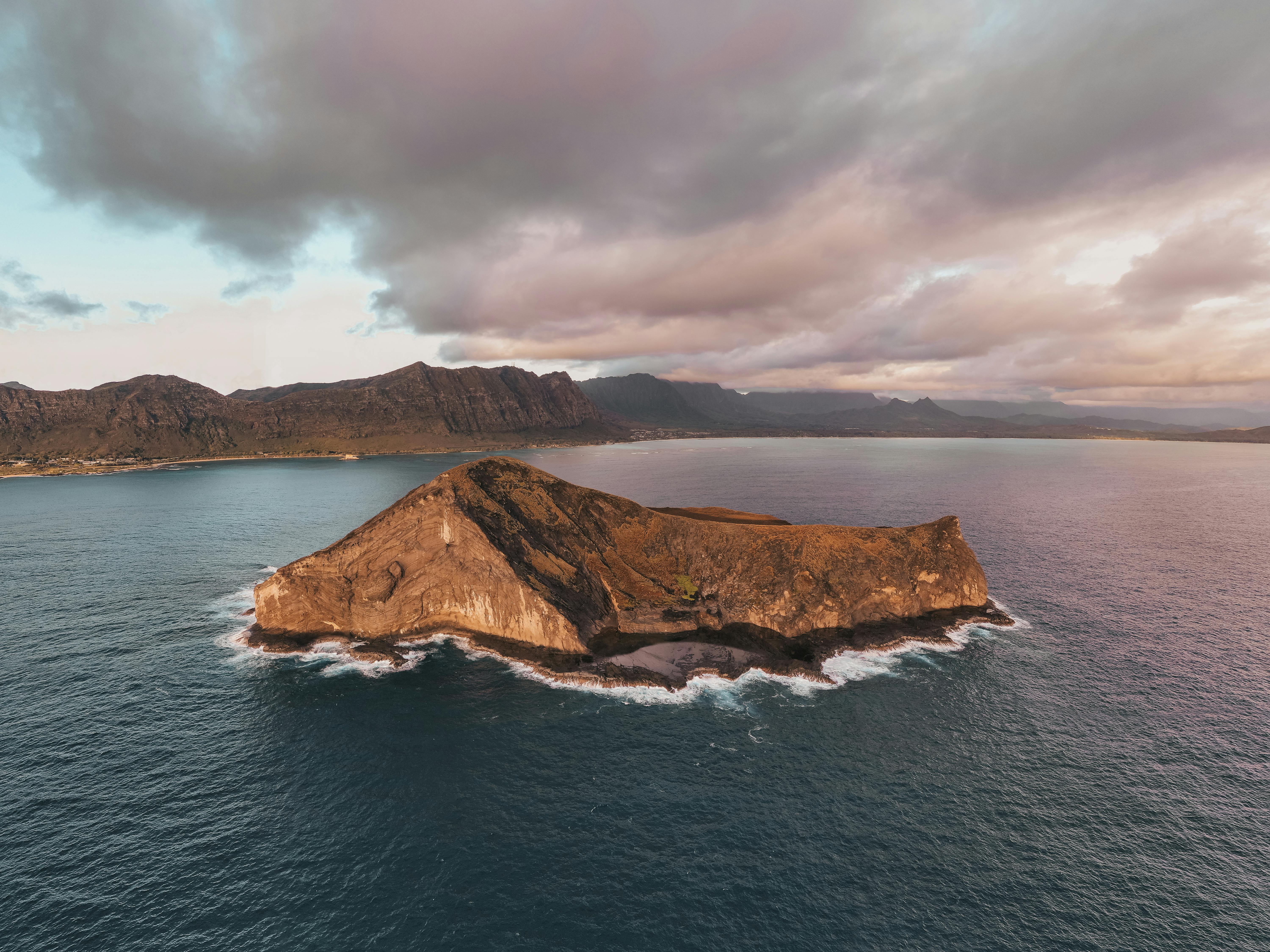 The rugged green island of Mokolii, known as Chinamans Hat, off the windward coast of Oahu near Kualoa