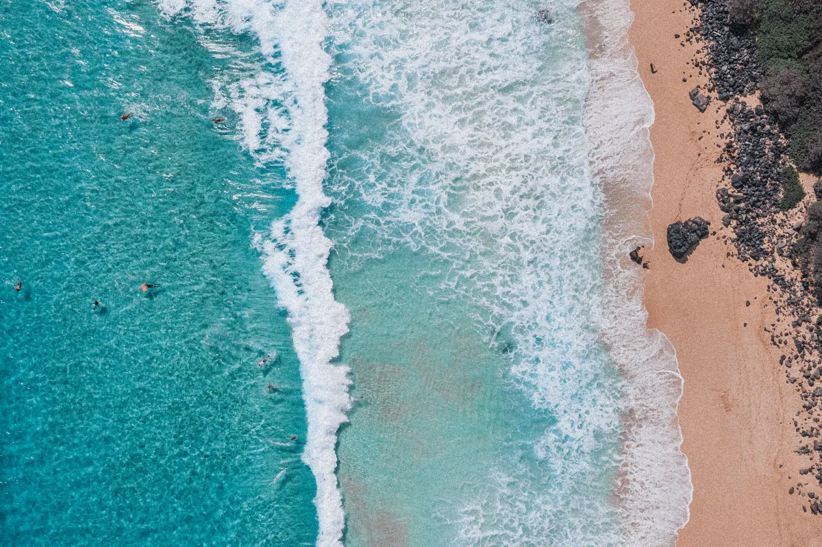 Aerial view of Waimanalo Beach with turquoise water on the windward coast of Oahu