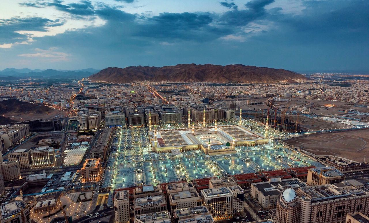 a stunning aerial view of al masjid an nabawi in medina at dusk showca