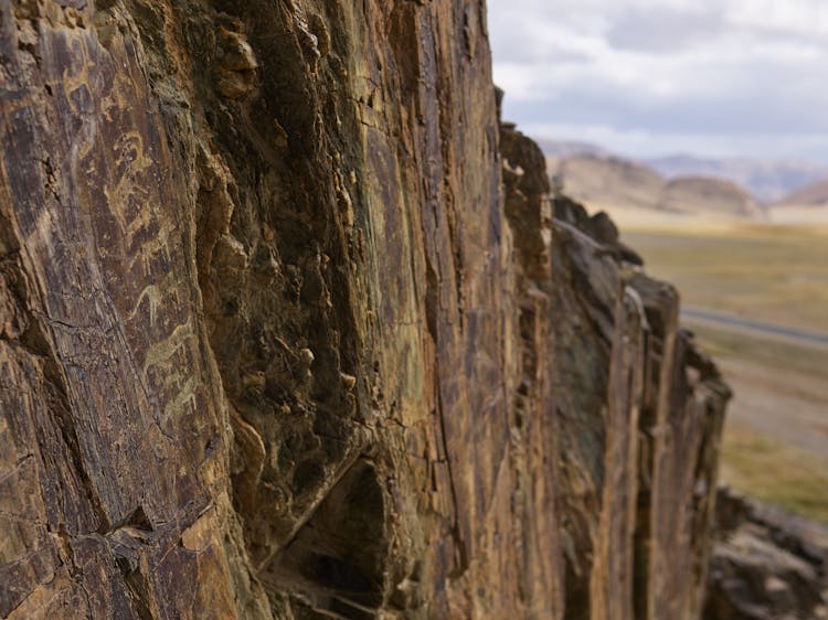 Mountain Surface With Ancient Petroglyphic Drawings