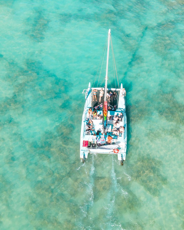 Modern Boat Floating On Blue Sea
