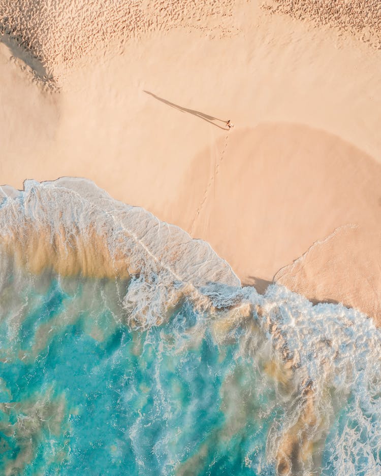 Ocean Seashore With Beautiful Turquoise Water And Sea Waves