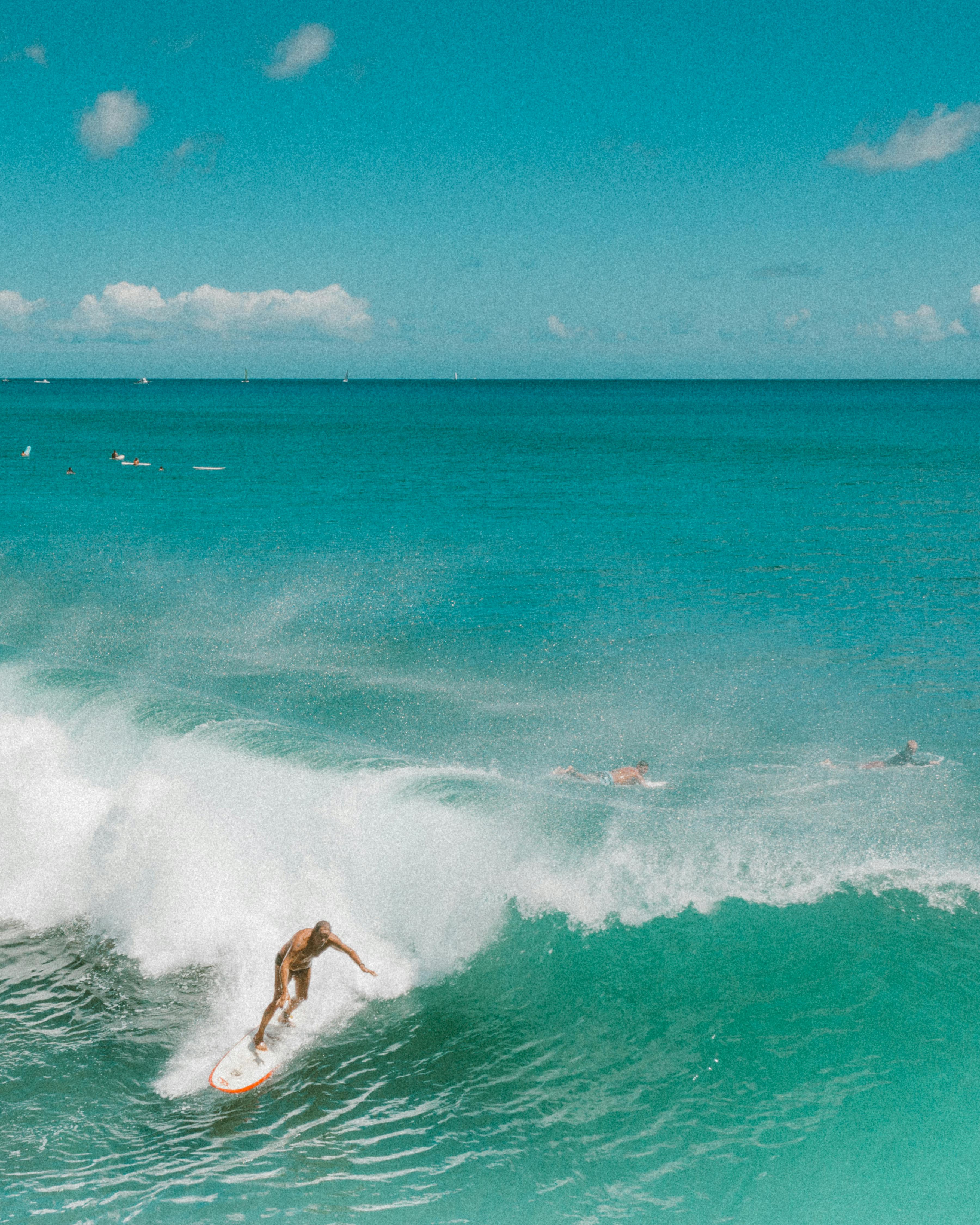 person surfing on sea waves