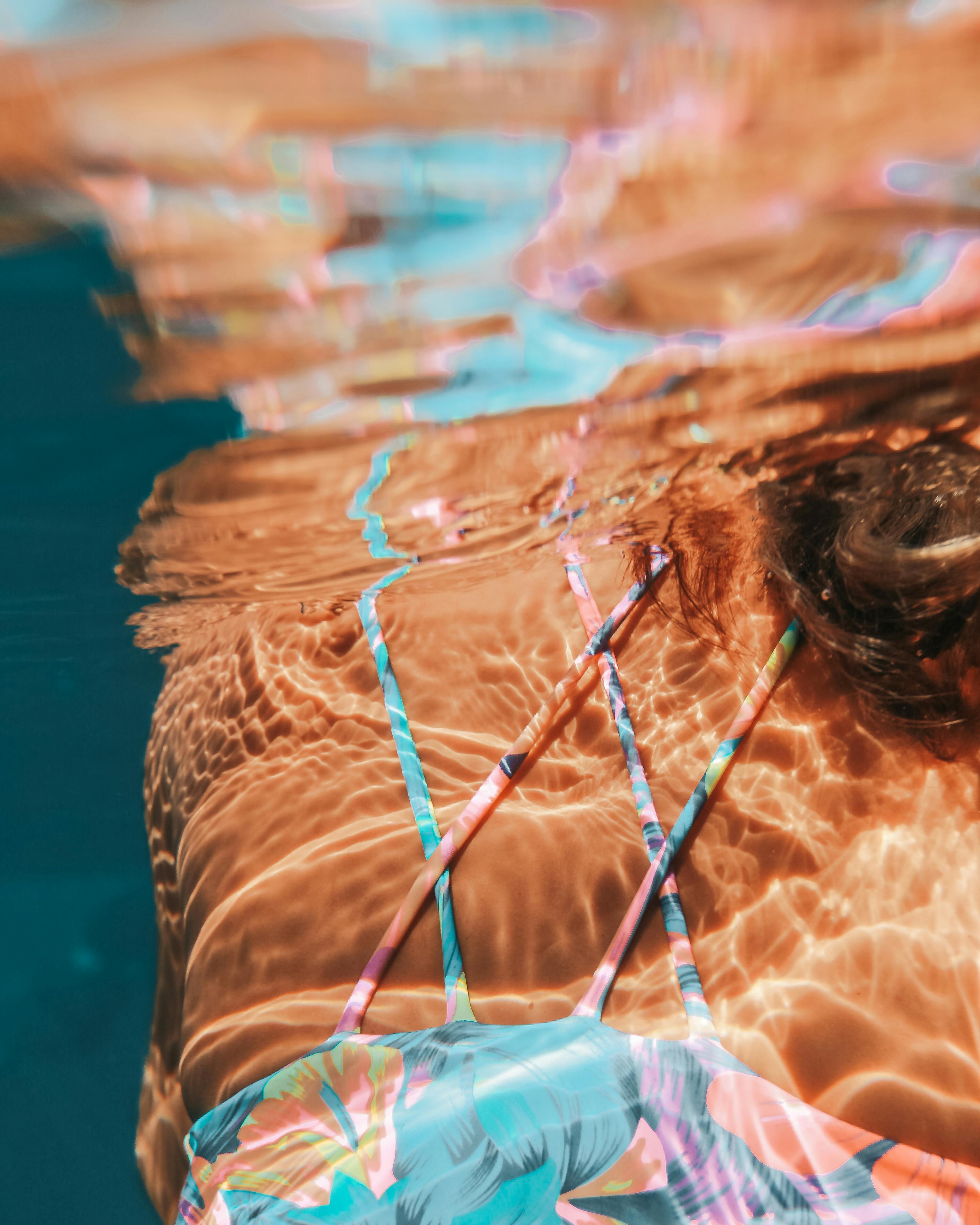 A Woman Swimming in the Ocean · Free Stock Photo