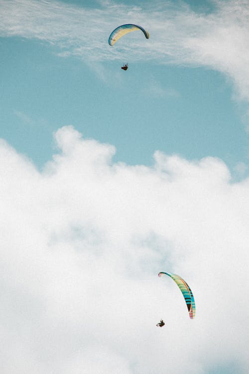 Free Parachutes on Clouds Stock Photo