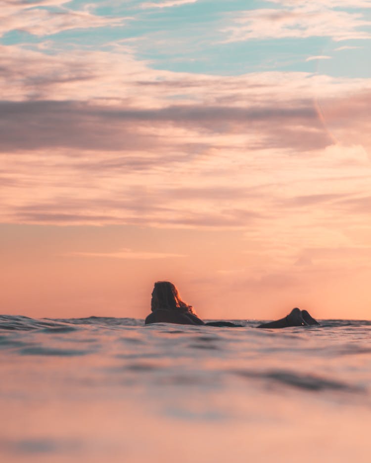 Surfer Waiting For Sea Waves