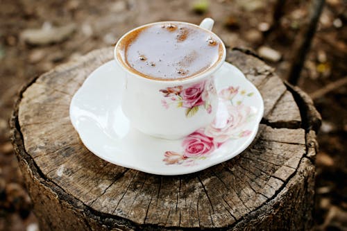 Free Ceramic cup with black frothy coffee Stock Photo