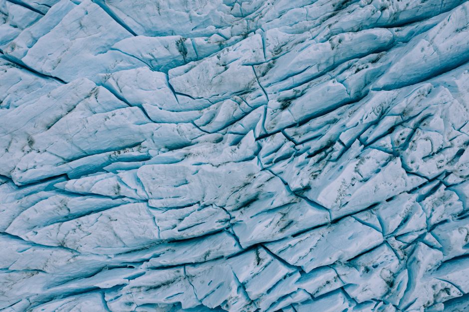 Detailed aerial shot of the stunning cracked surface of Perito Moreno Glacier in Argentina.