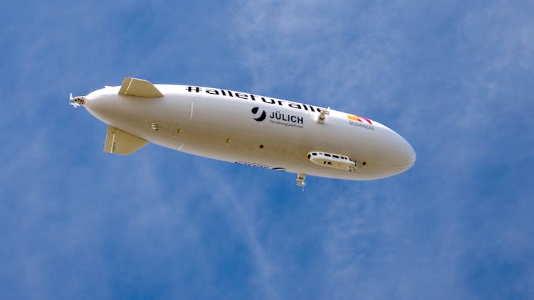 Modern Airship In Cloudy Sky