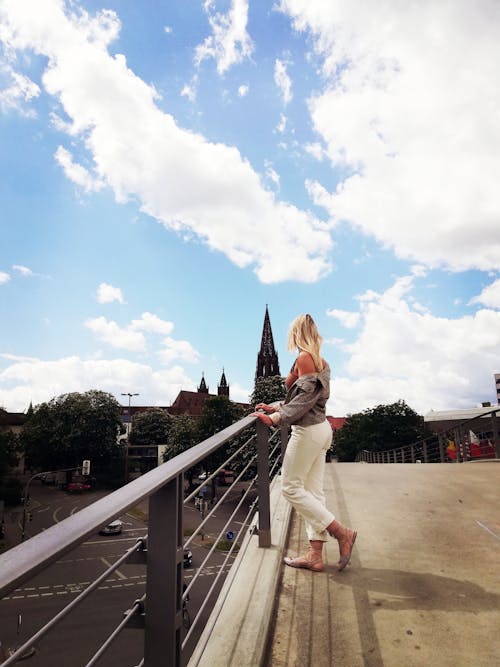 Free stock photo of blonde girl, bridge, city street