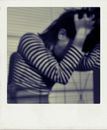 Retro shot of anxious anonymous woman