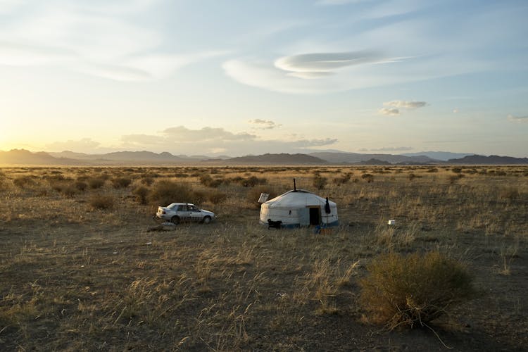 Yurt And Car In Remote Endless Terrain