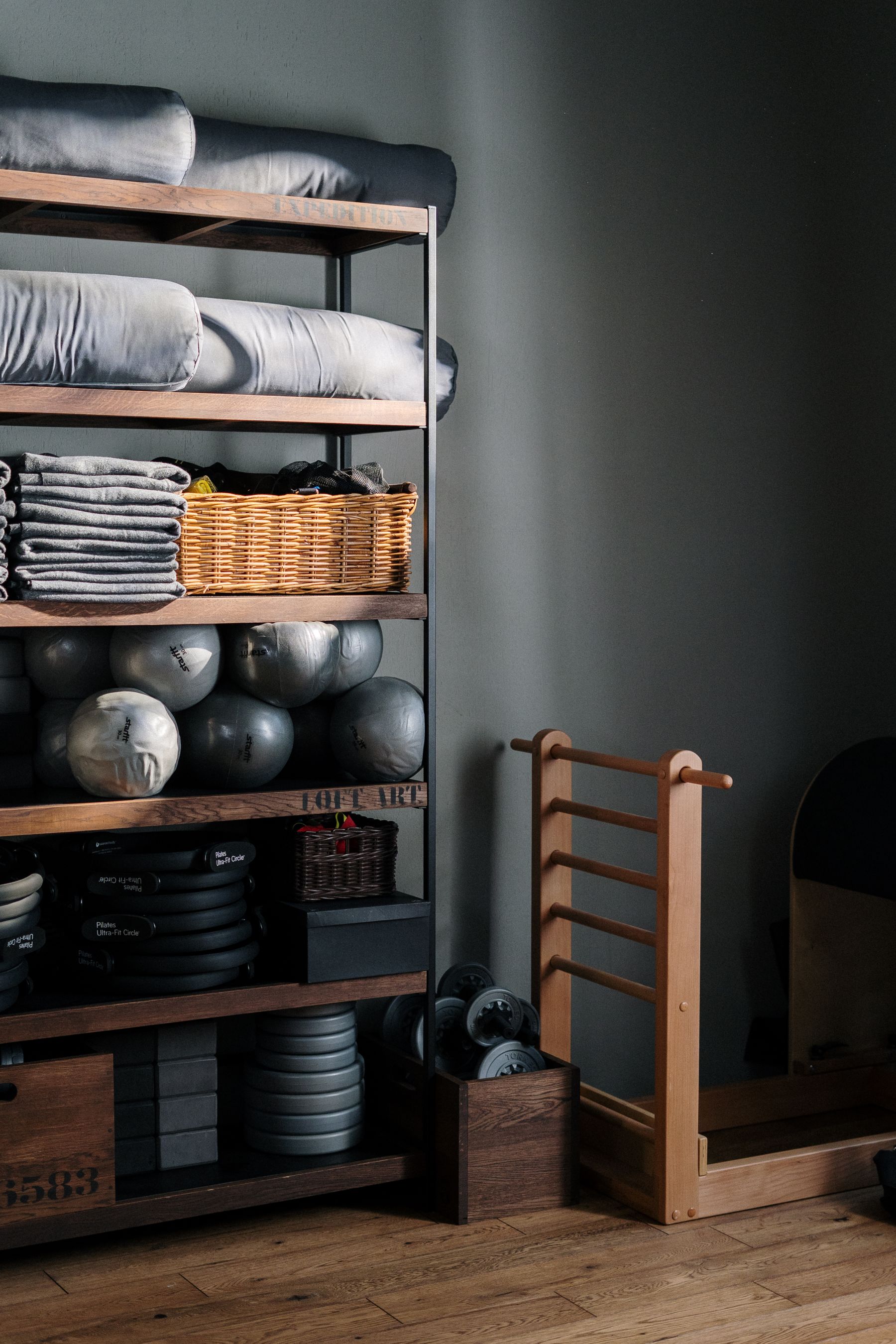 Athlete using a resistance band and exercise mat in a modern home training environment