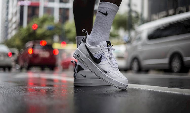 Person Wearing White Nike Air Force 1