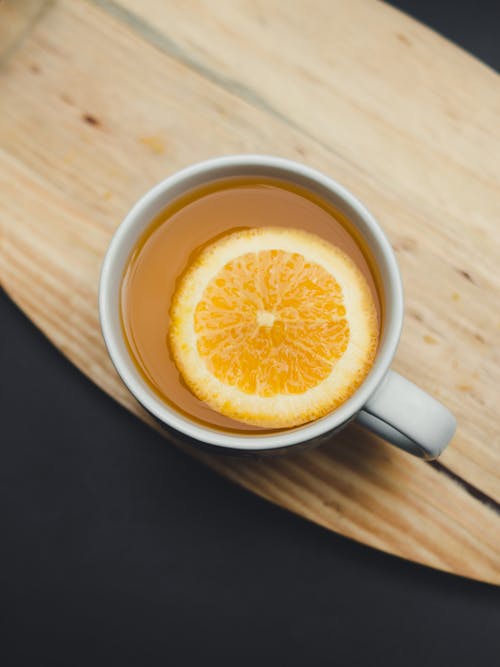 White Ceramic Mug With Orange Slice Inside