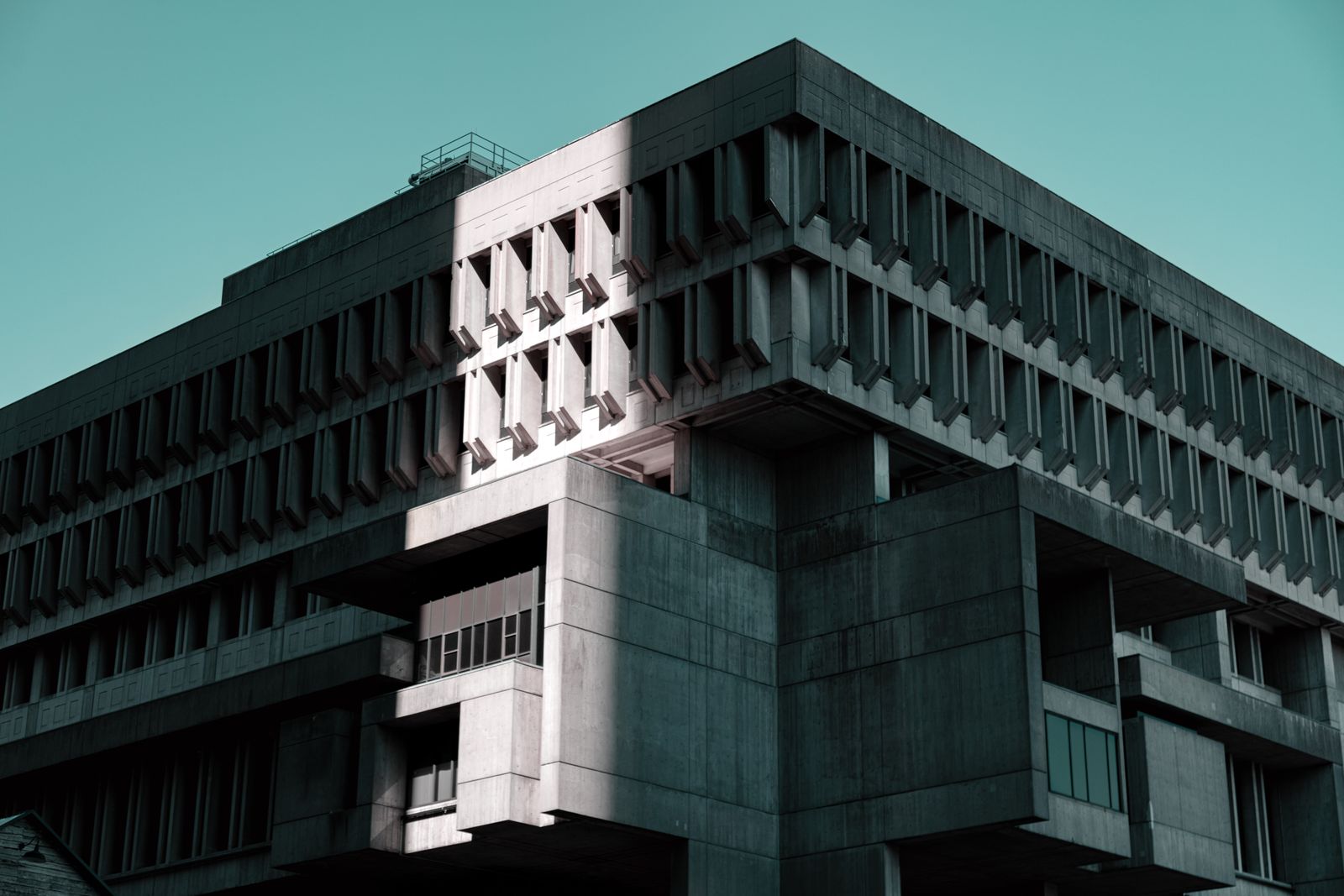 Concrete brutalist building facade — photo by Steve Pancrate on Pexels