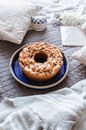 Doughnut on Blue Ceramic Plate