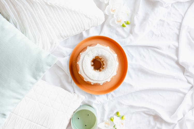 Bundt Cake Beside Throw Pillows