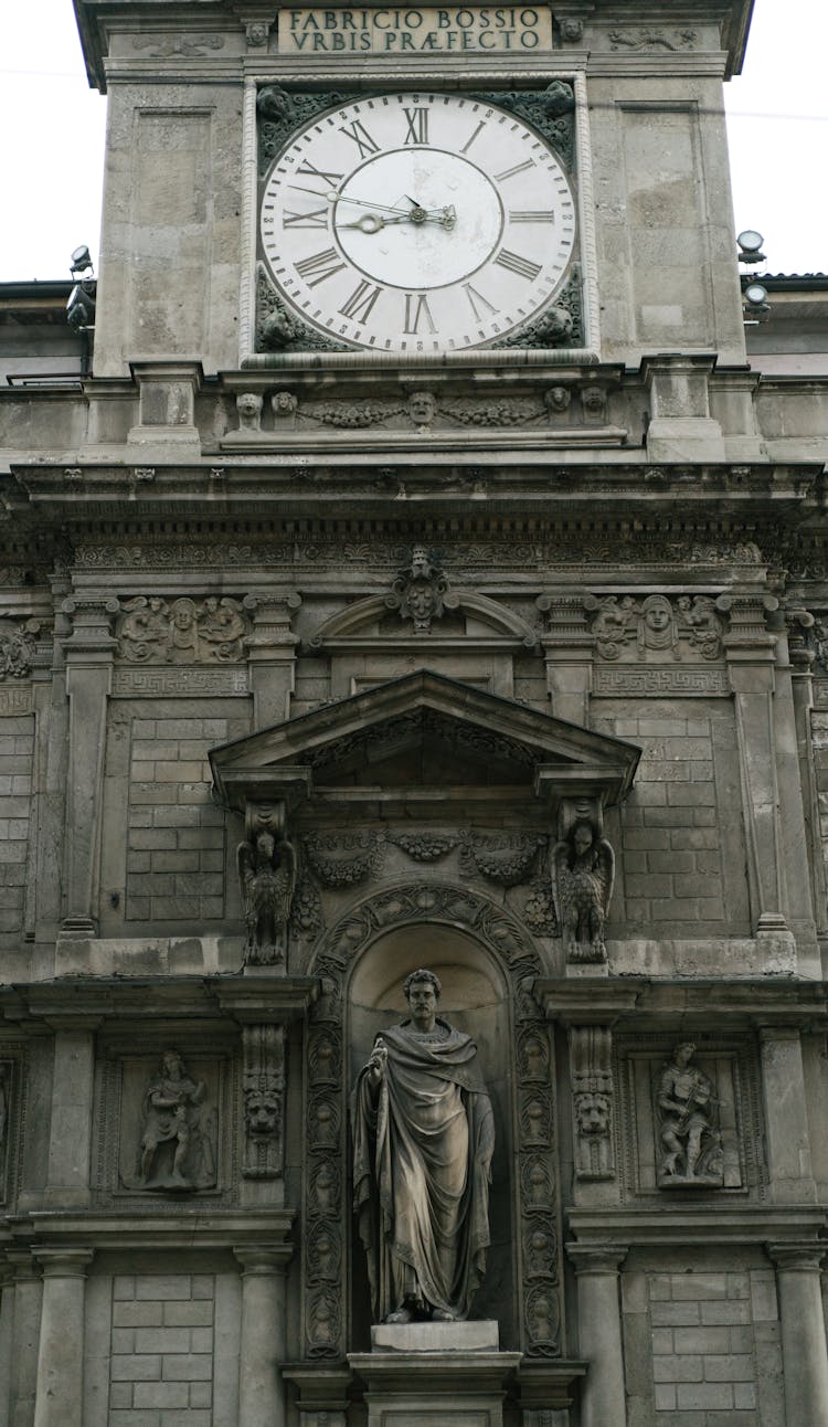 Fabricio Bossio Clock Tower In Daylight