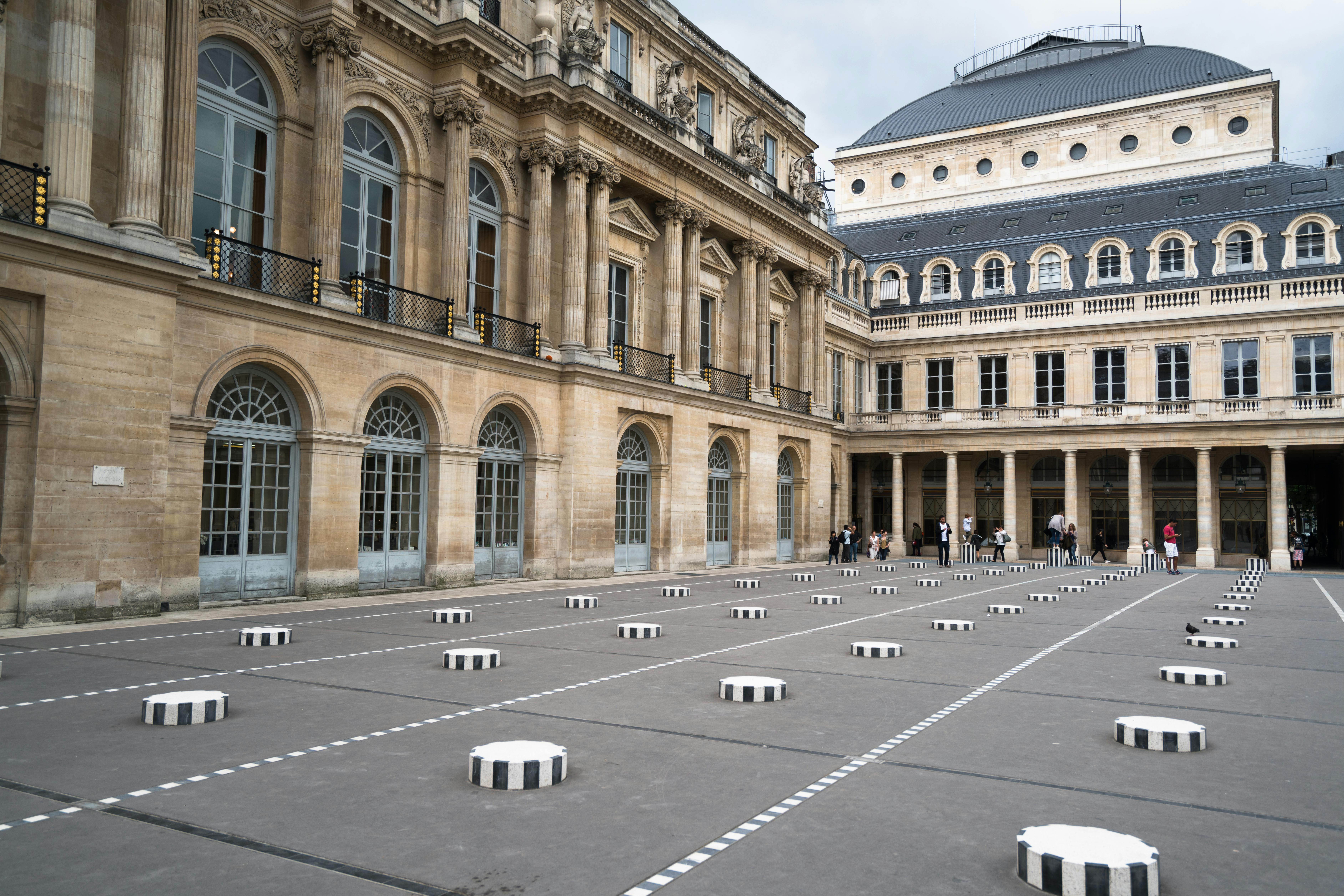 palais royal courtyard in paris on fine day