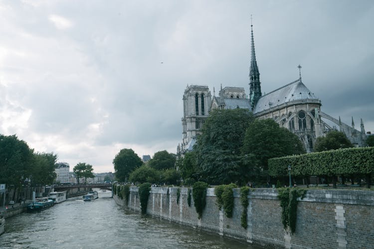 Rear View Of Notre Dame On River Seine