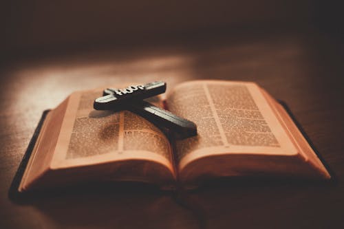 A Bible with Wooden Cross