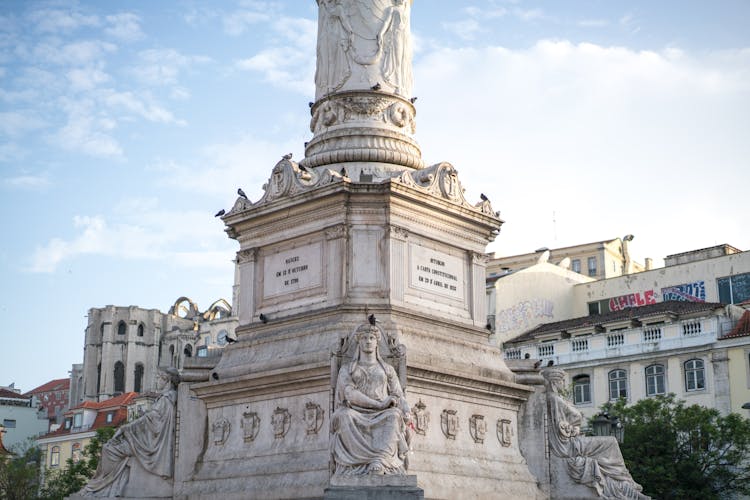 Bottom Of Column Of Pedro IV In Lisbon On Sunny Day