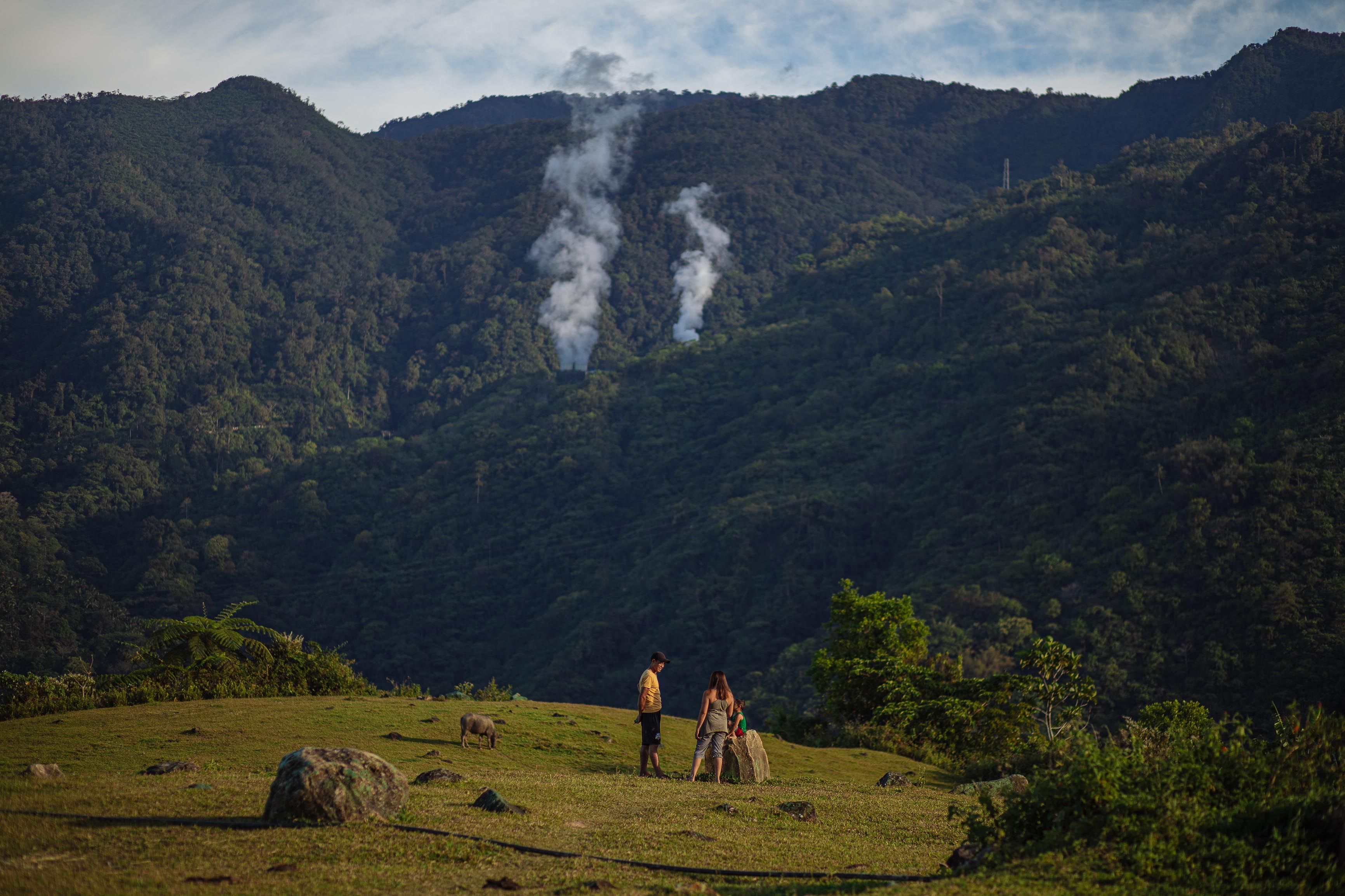 Man and Woman Standing on Mountain Area · Free Stock Photo