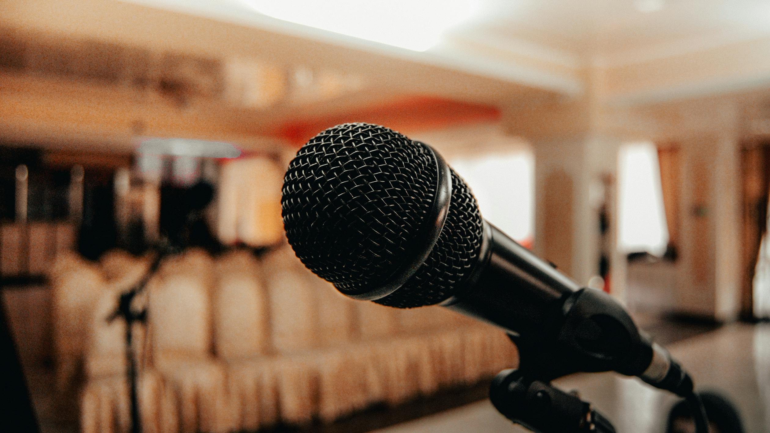 Public Speaking Photo by Borta from Pexels: https://www.pexels.com/photo/black-microphone-in-light-conference-hall-4331578/