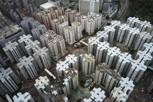 Stunning aerial view of modern high-rise apartments in Kowloon, Hong Kong.