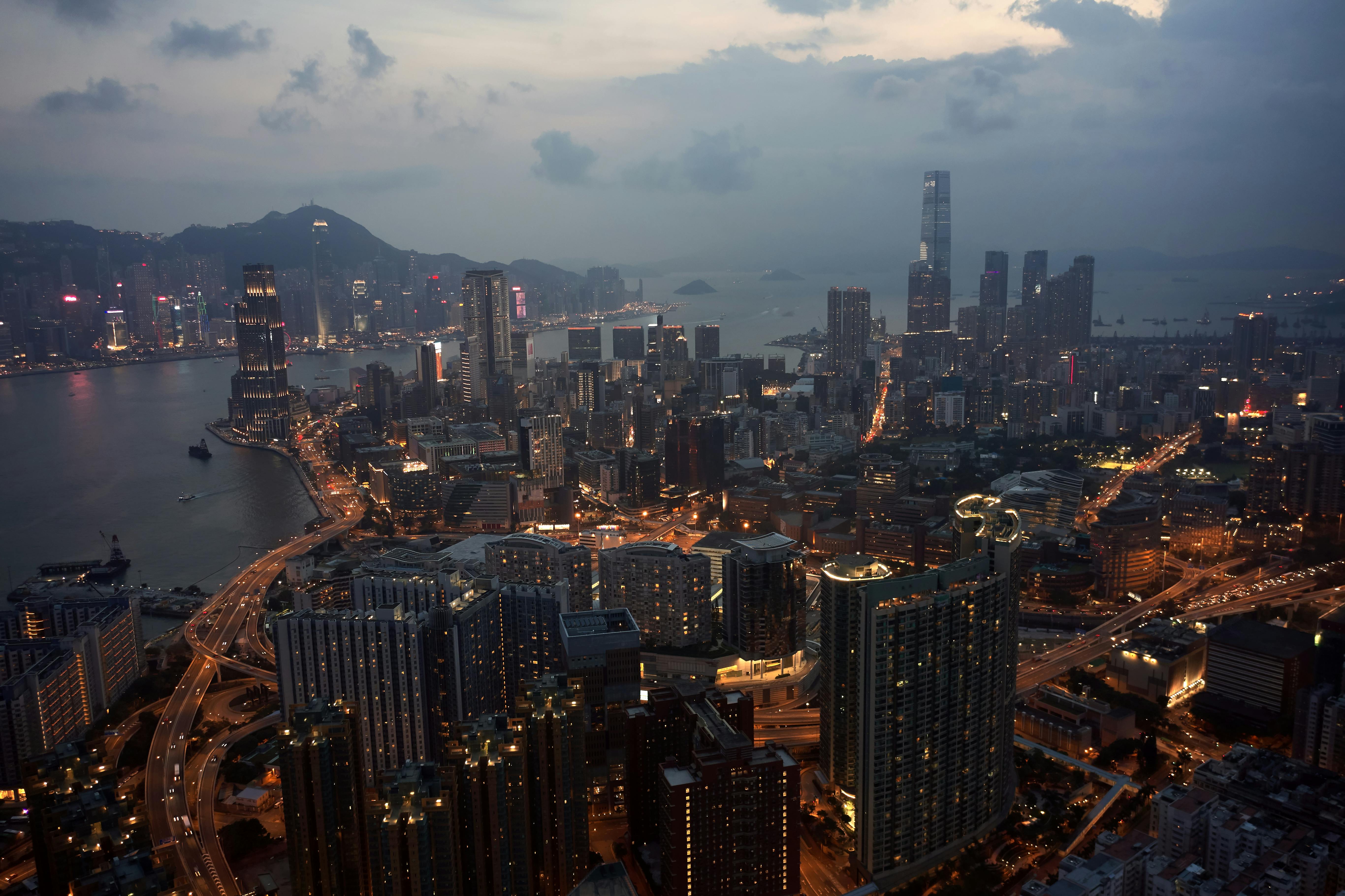 Aerial View of City Buildings Near Body of Water · Free Stock Photo