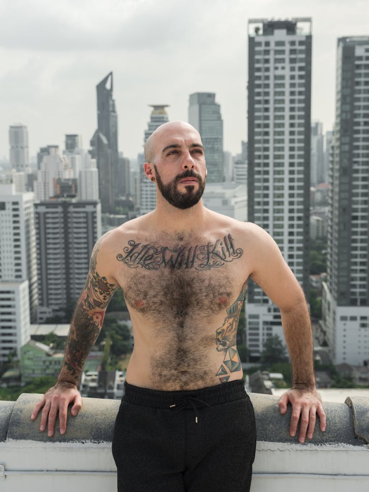 Shirtless Sportsman On Rooftop In Hong Kong