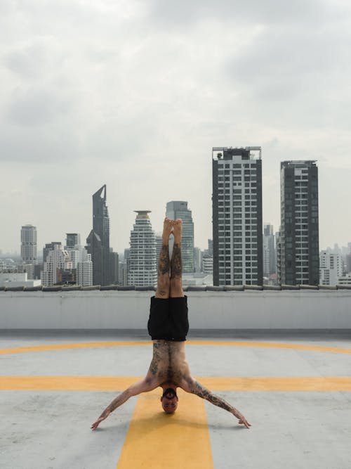 Photo of Man Doing Headstand