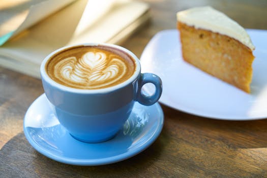 Coffee Latte with Frothy Milk in Tall Glass · Free Stock Photo