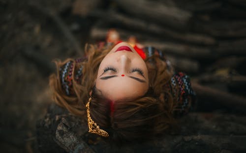 A Woman with Bindi on Her Forehead