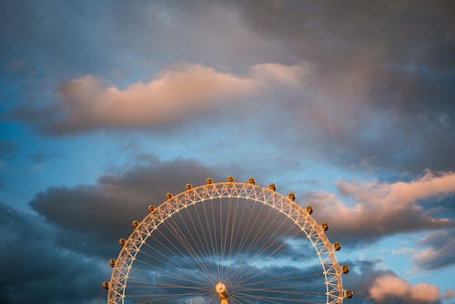 Free White Ferris Wheel Under Cloudy Sky Stock Photo