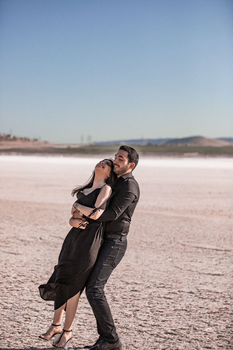 Loving Couple Having Fun On Beach