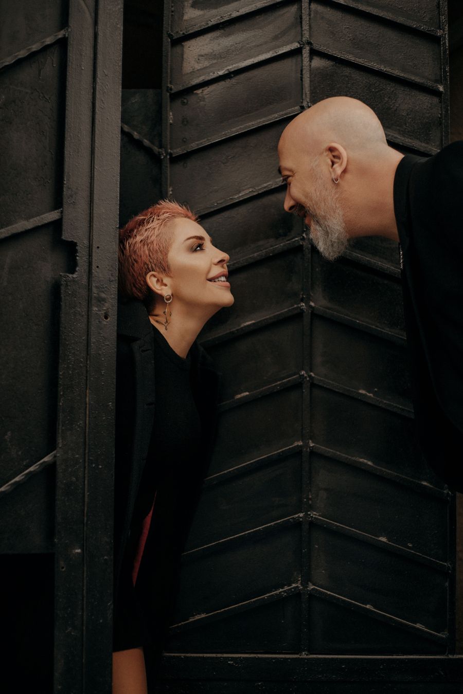 Mature adult couple sharing a playful and affectionate conversation