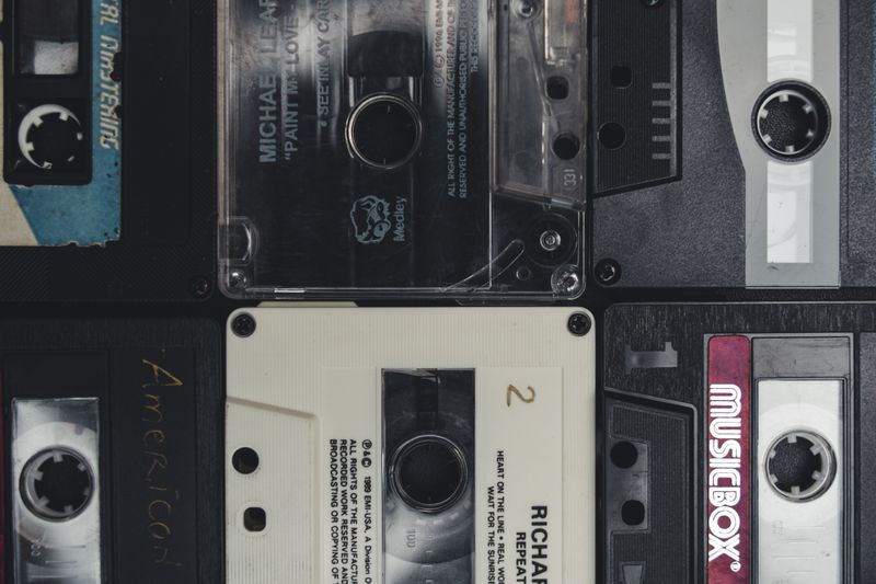 Close-up view of old cassette tapes, showcasing a nostalgic retro feel.
