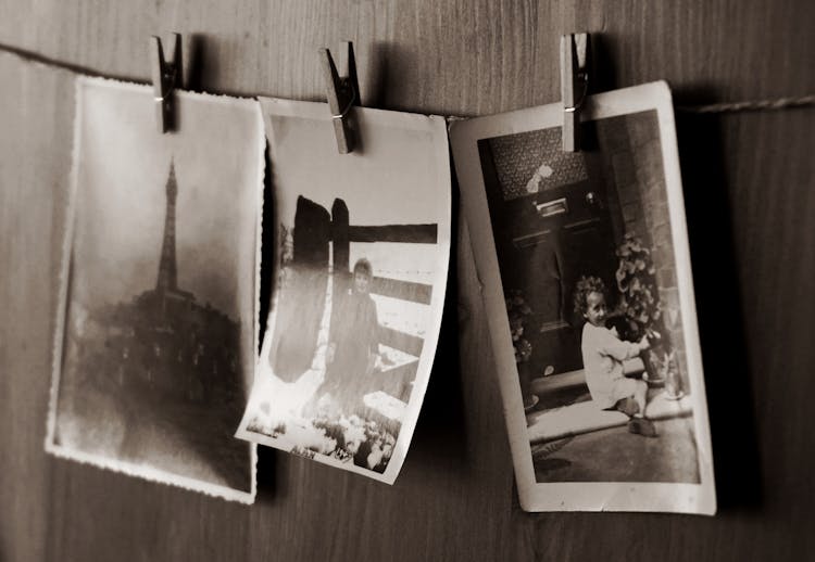 Photos Hanging On A Clothes Line