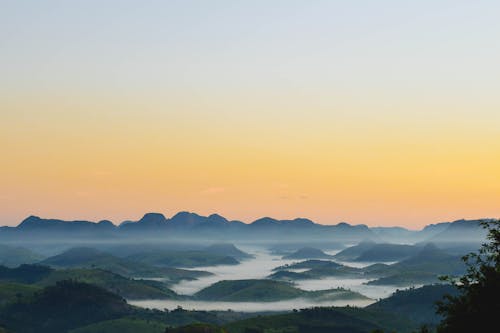 Panorama of the Valley Hidden in the Morning Fog