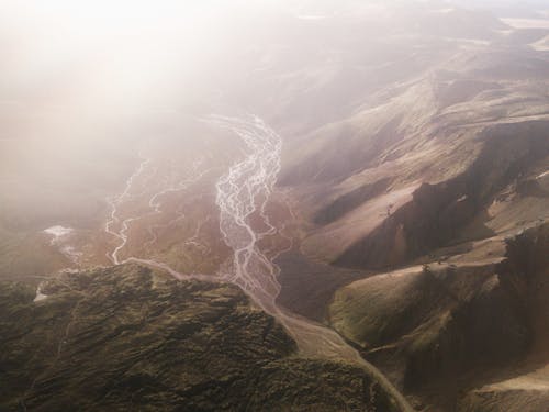 Free Aerial View of Mountains and a Valley Stock Photo