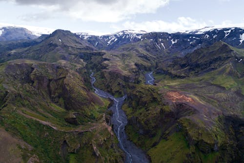 Picturesque Thorsmork mountain ridge covered with moss and volcanic ash