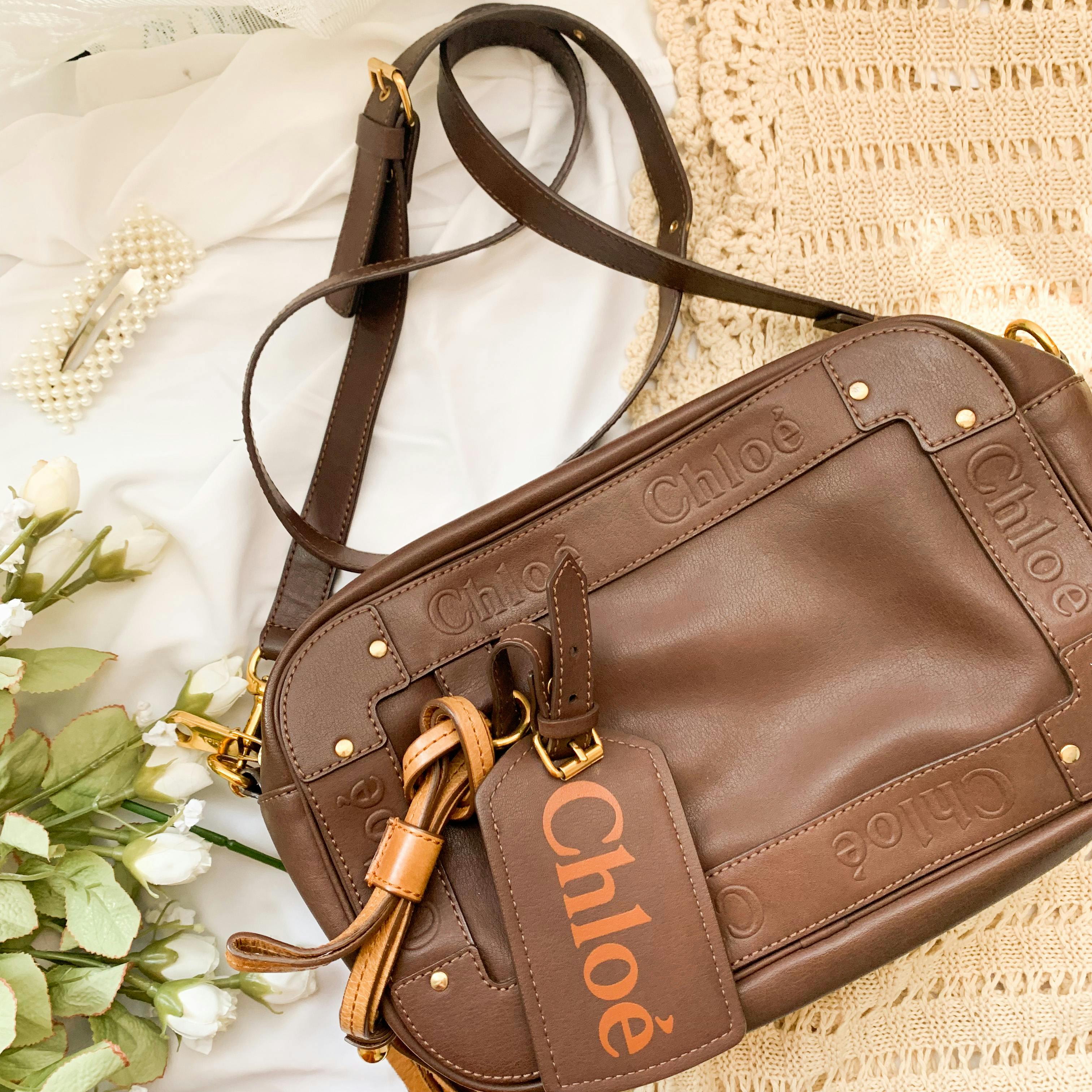 a brown leather shoulder bag