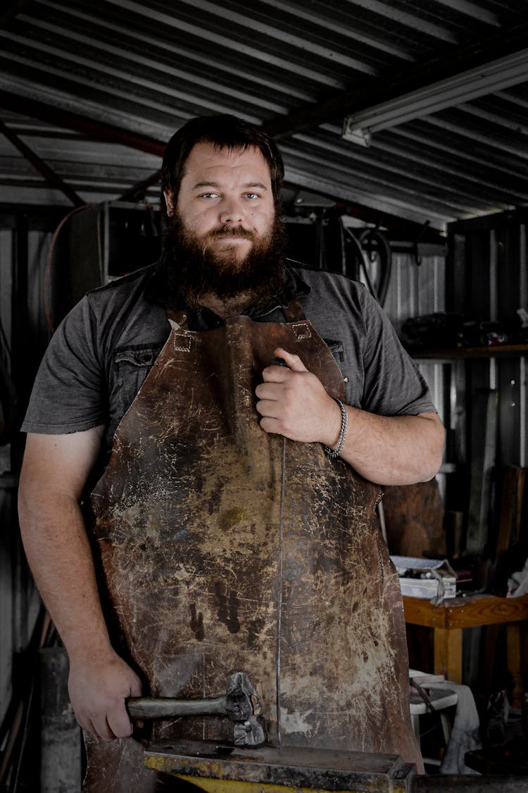 Blacksmith In Workshop