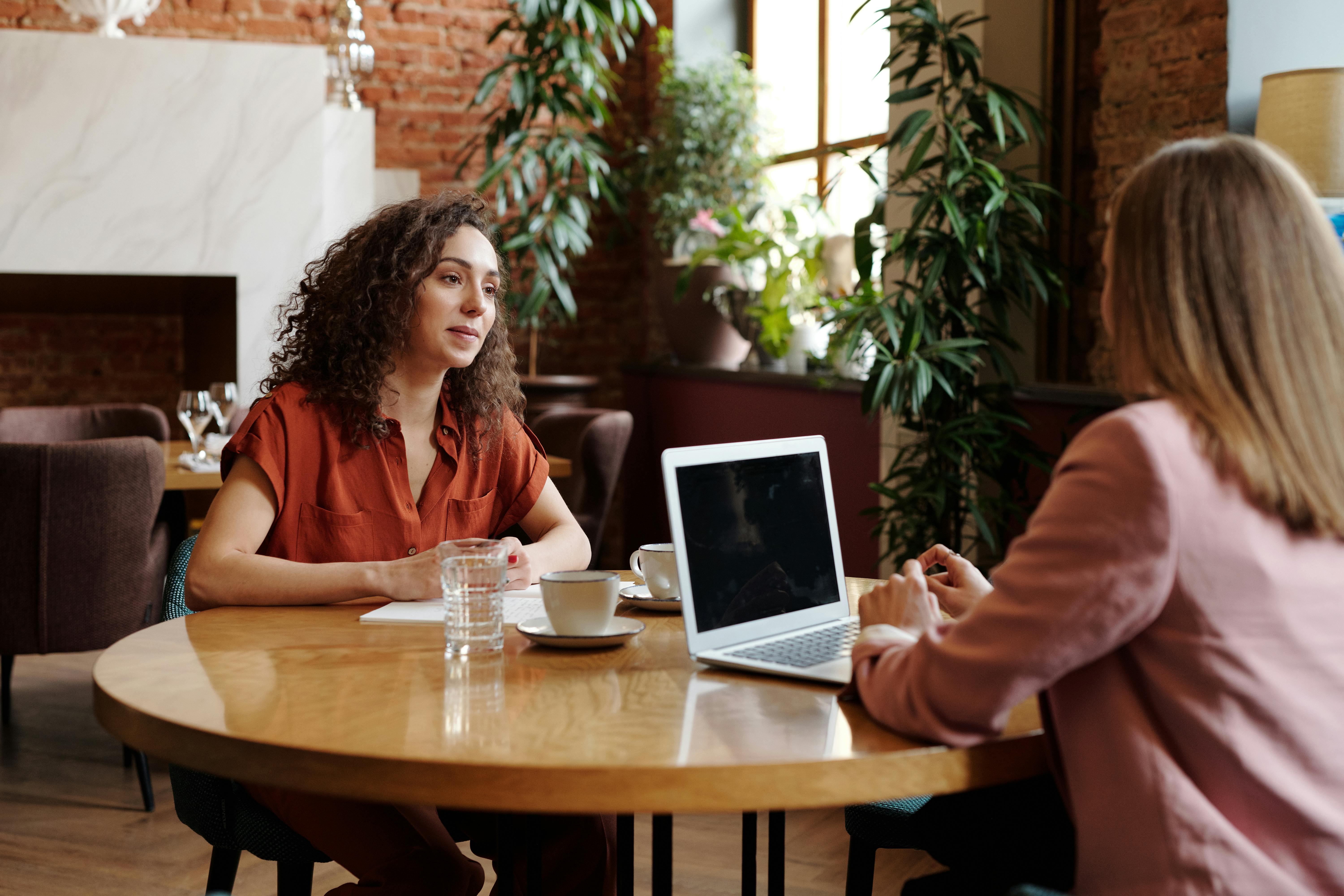 Two women during an interview meeting 