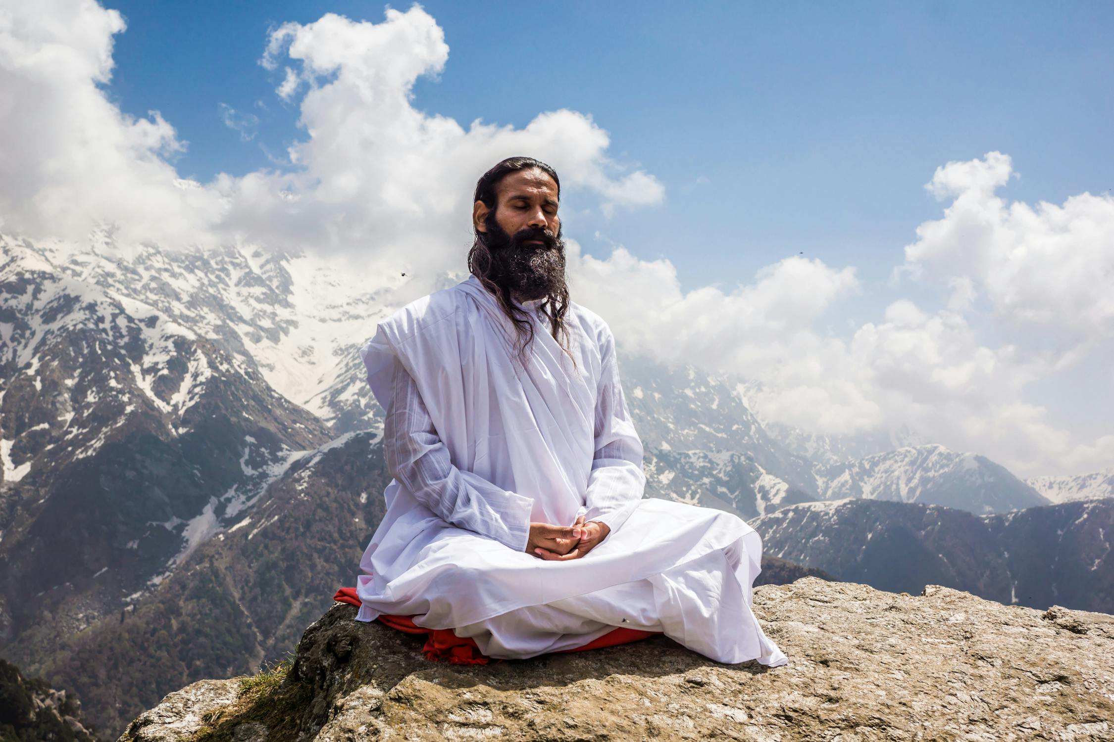 Meditation Photo by Dvine Yoga from Pexels: https://www.pexels.com/photo/a-man-in-white-thobe-meditating-on-the-mountain-top-4340795/
